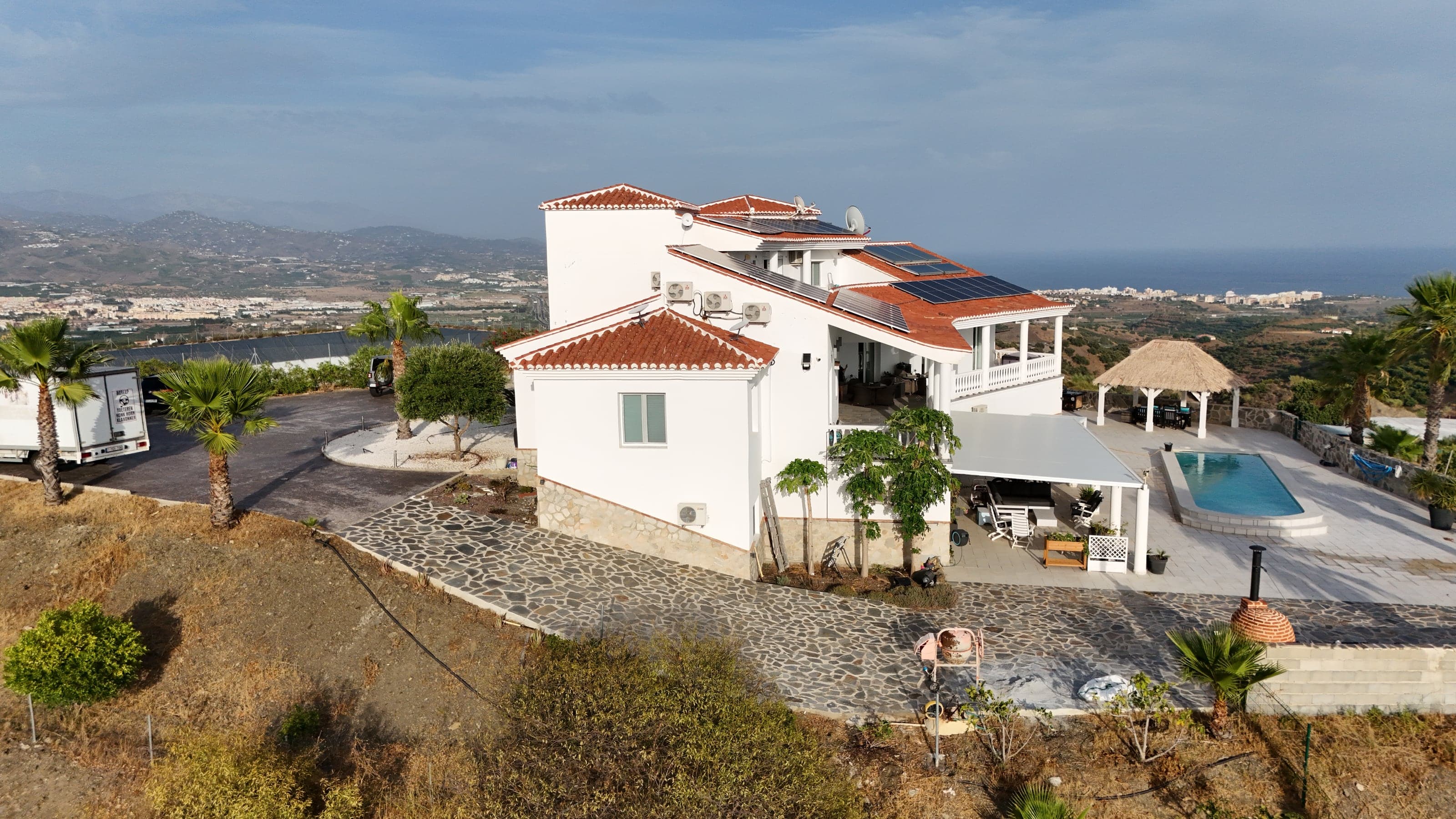 Aerial view of the pool overlooking the coastline